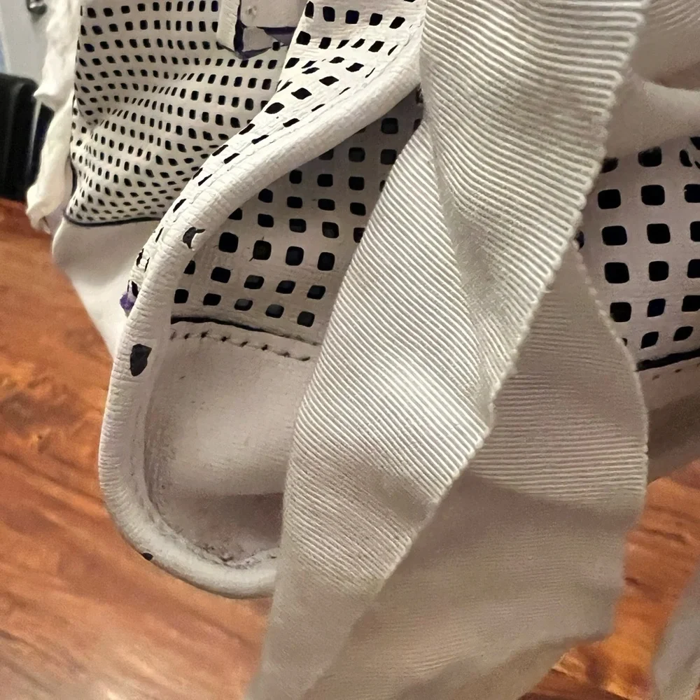 Juicy Couture White and Black Perforated Satchel